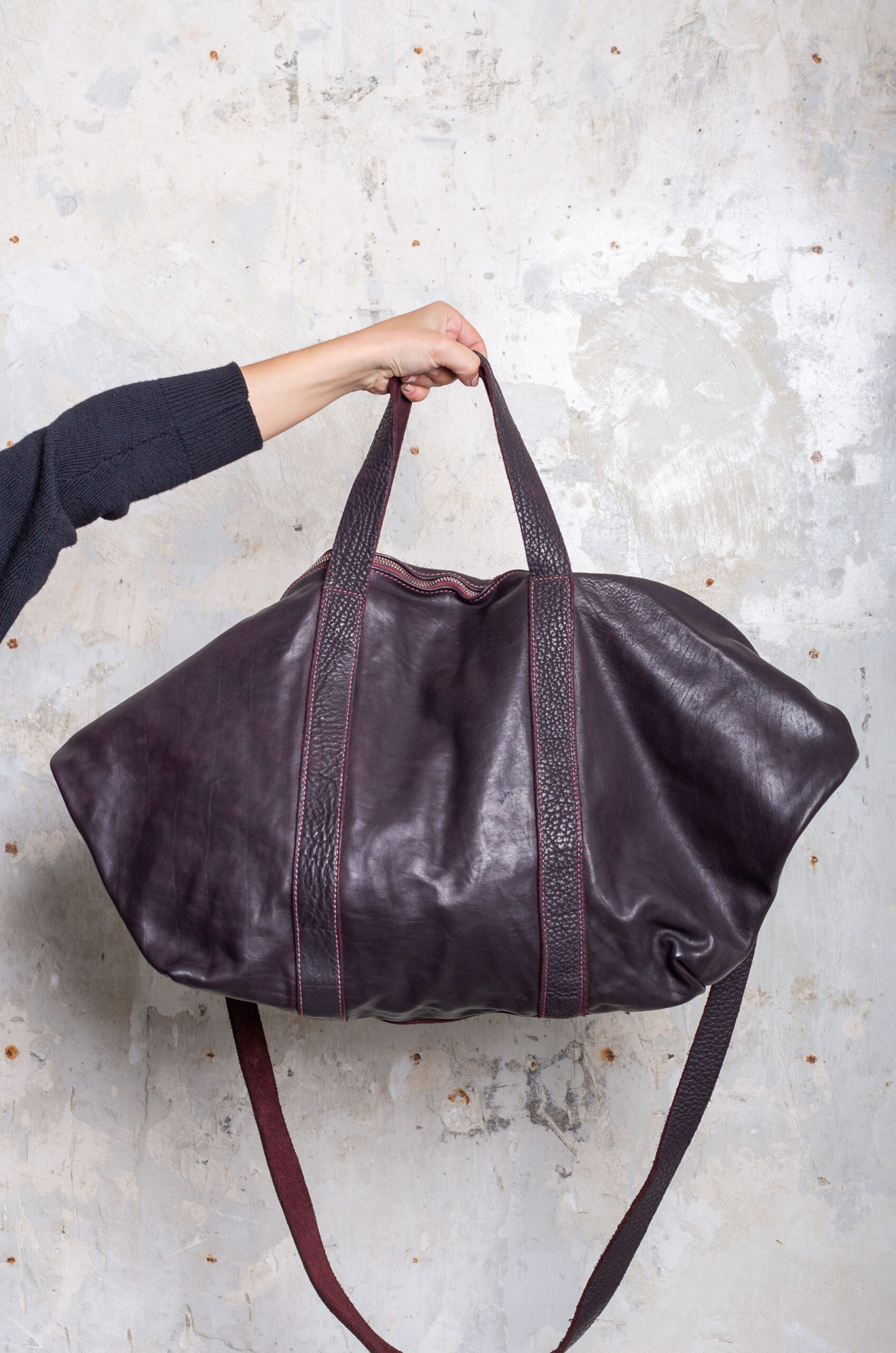 Givenchy - The L.C. small weekender bag in burgundy taurillon