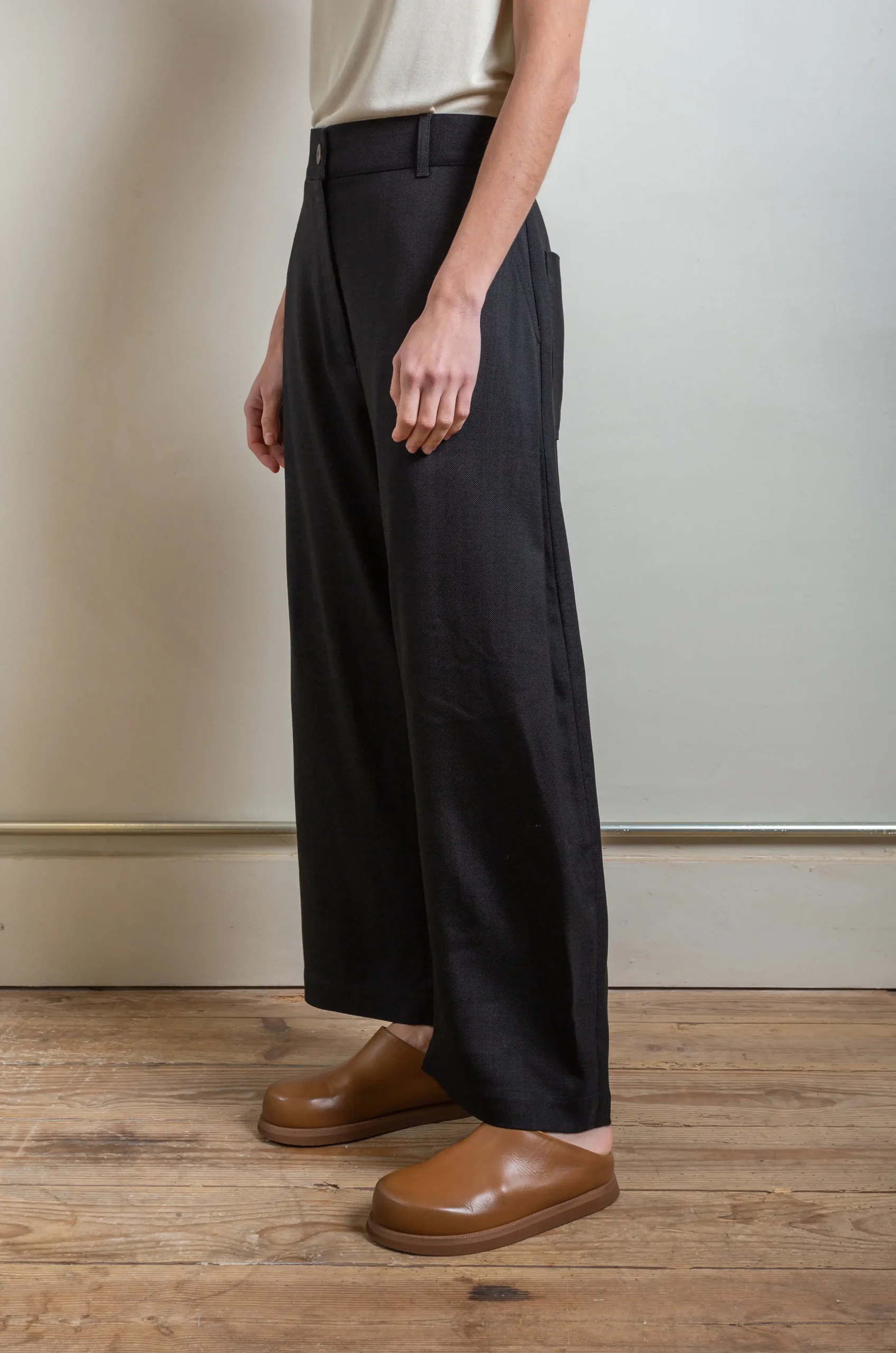 Black Chalco cropped denim trousers, Studio Nicholson